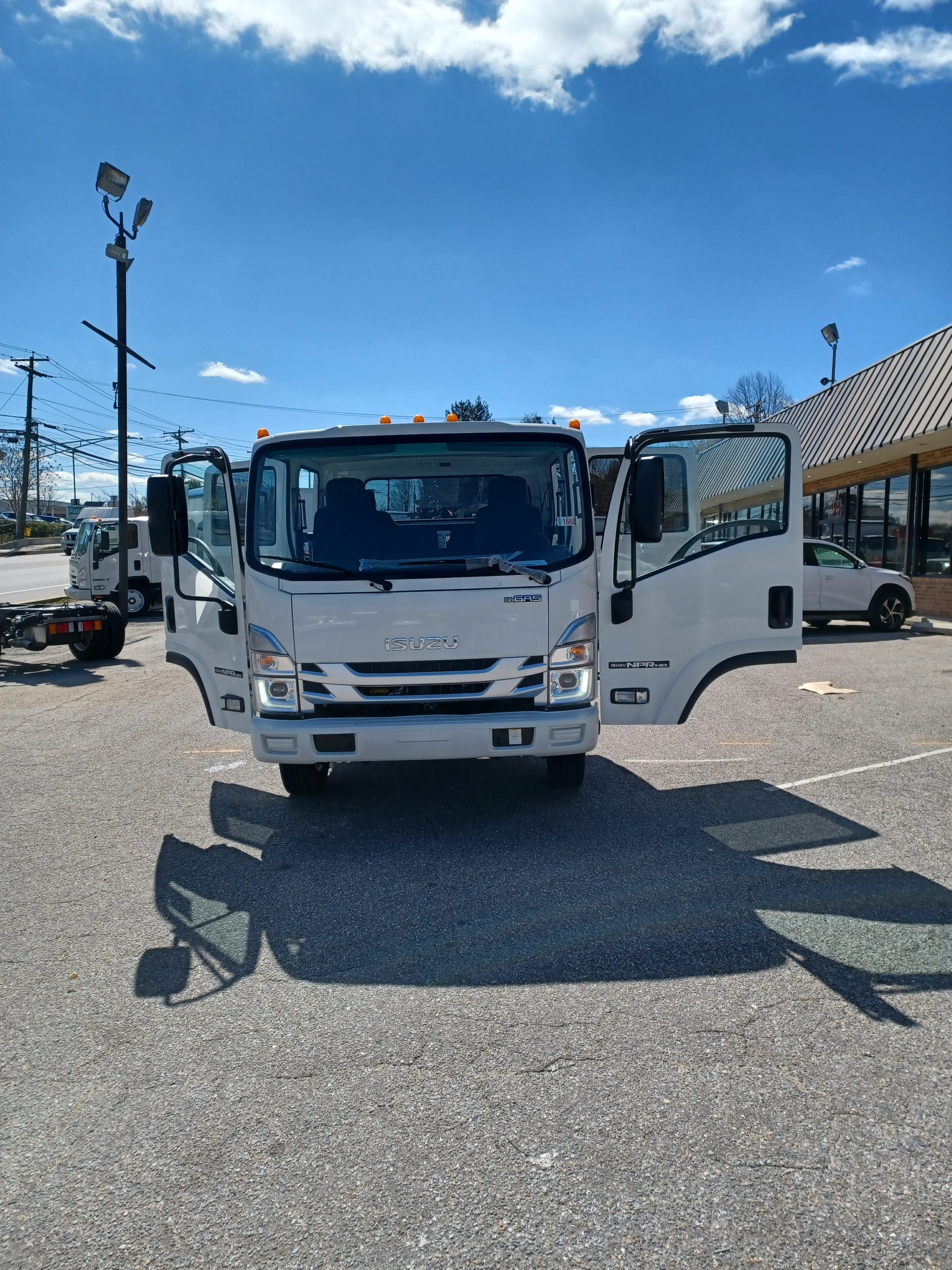 2024 Isuzu NPR HD Crew Cab Dovell & Williams